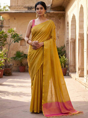 Classic Mustard Solid Tissue Silk Saree Featuring Intricate Zari Weaving & Tassel Pallu - Image 1