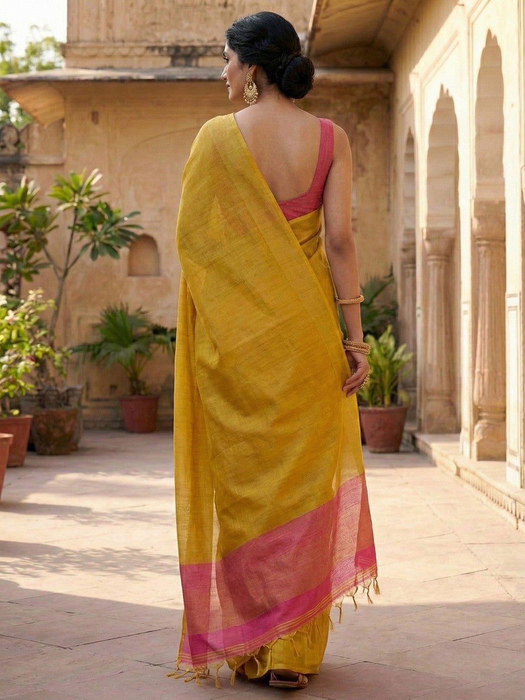 Classic Mustard Solid Tissue Silk Saree Featuring Intricate Zari Weaving & Tassel Pallu - Image 3