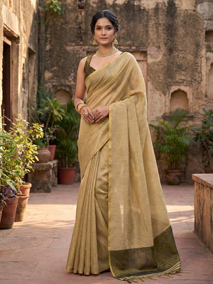 Classic Cream Solid Tissue Silk Saree Featuring Intricate Zari Weaving & Tassel Pallu - Image 1