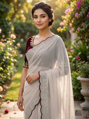 Luxurious Cream Georgette Saree with Sequins Butti and Scalloped Border - Image 2
