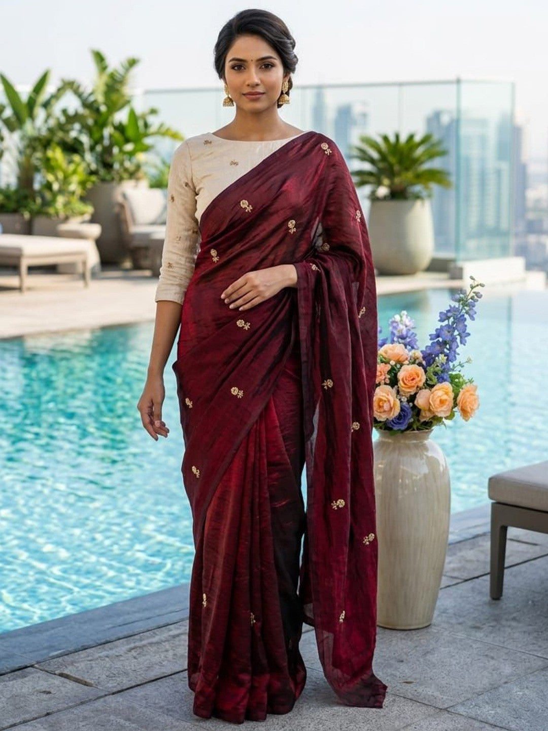 Elegant Maroon Organza Satin Silk Saree Featuring Floral Butti Sequins Embroidery & Tassel Pallu - Image 1