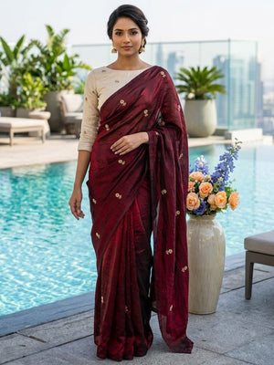 Elegant Maroon Organza Satin Silk Saree Featuring Floral Butti Sequins Embroidery & Tassel Pallu - Image 1