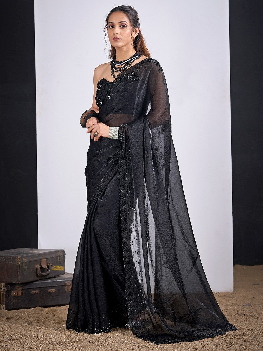 Glamorous Black Satin Silk Saree Featuring Rich Stone Work With Cut Dana & Sequins - Image 1