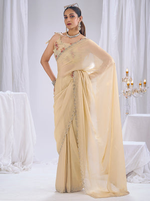 Premium Cream Art Silk Saree With Stone & Cutdhana Border Embellishment - Image 1