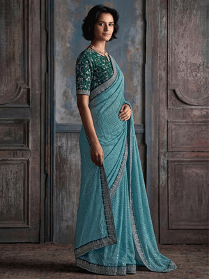 Stylish Blue Vichitra Silk Saree Highlighted With Foil Print & Elegant Embroidered Border - Image 2