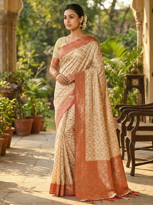 Luxurious Cream Banarasi Silk Saree With Floral Zari Weaving & Tassels Pallu - Image 1