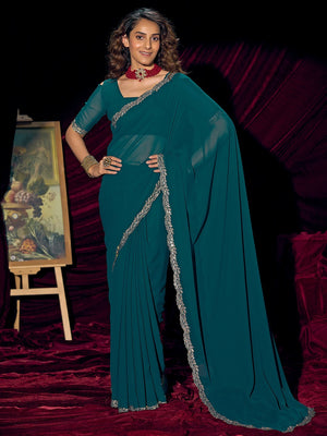 Glamorous Teal Solid Georgette Saree Featuring Embellished Stone Border Work - Image 1