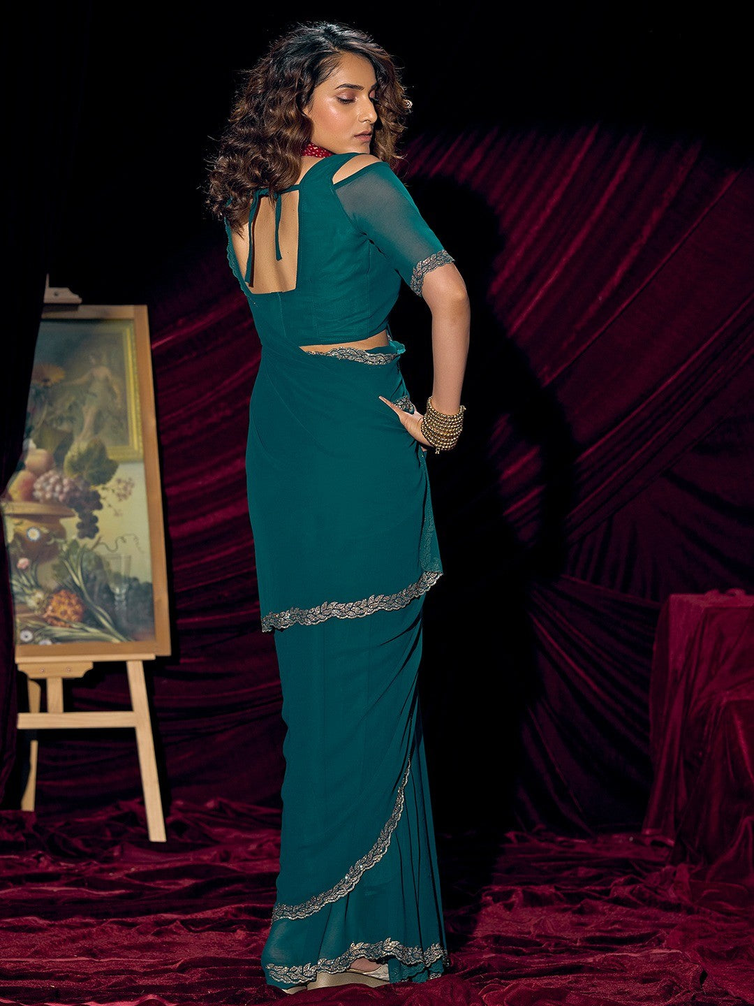 Glamorous Teal Solid Georgette Saree Featuring Embellished Stone Border Work - Image 3