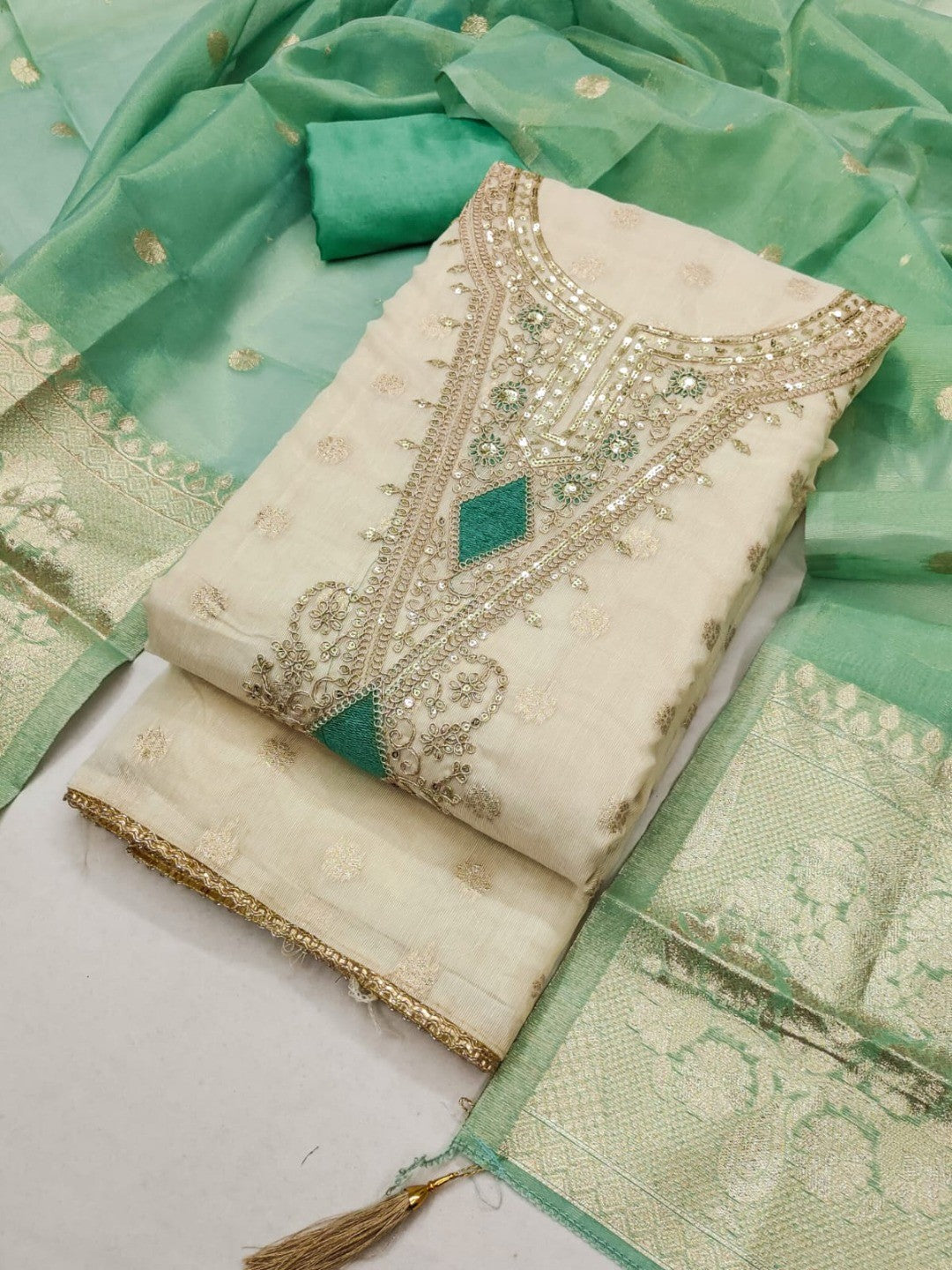Elegant Cream & Turquoise Cording Sequins Embroidered Shimmer Dress Material With Butti Weaving Work - Image 1