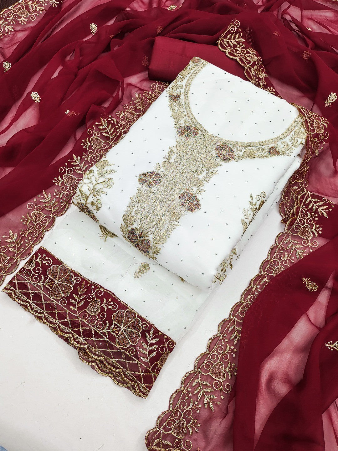 Beautiful White & Maroon Floral Embroidery With Sparkling Diamond Work Georgette Dress Material - Image 1