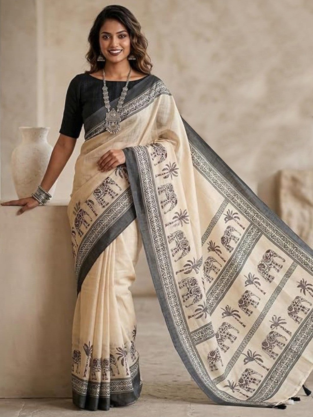 Cream Linen Saree with Animal Print and Contrast Border - Image 1