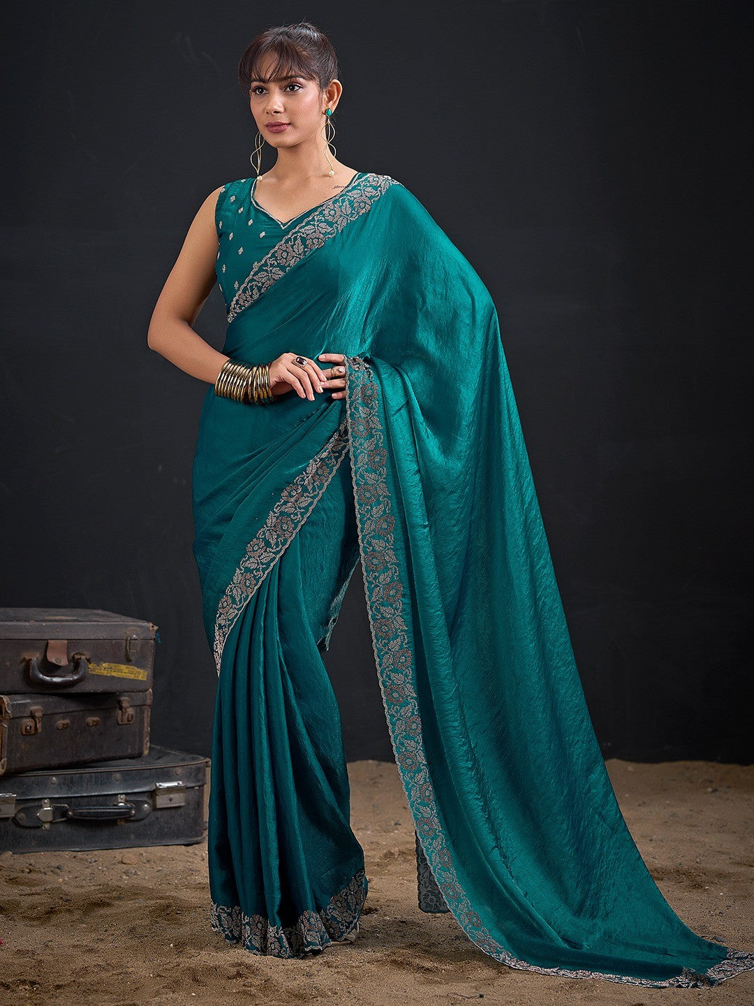 Luxurious Teal Solid Satin Silk Saree Adorned With Floral Stone Work Border - Image 1