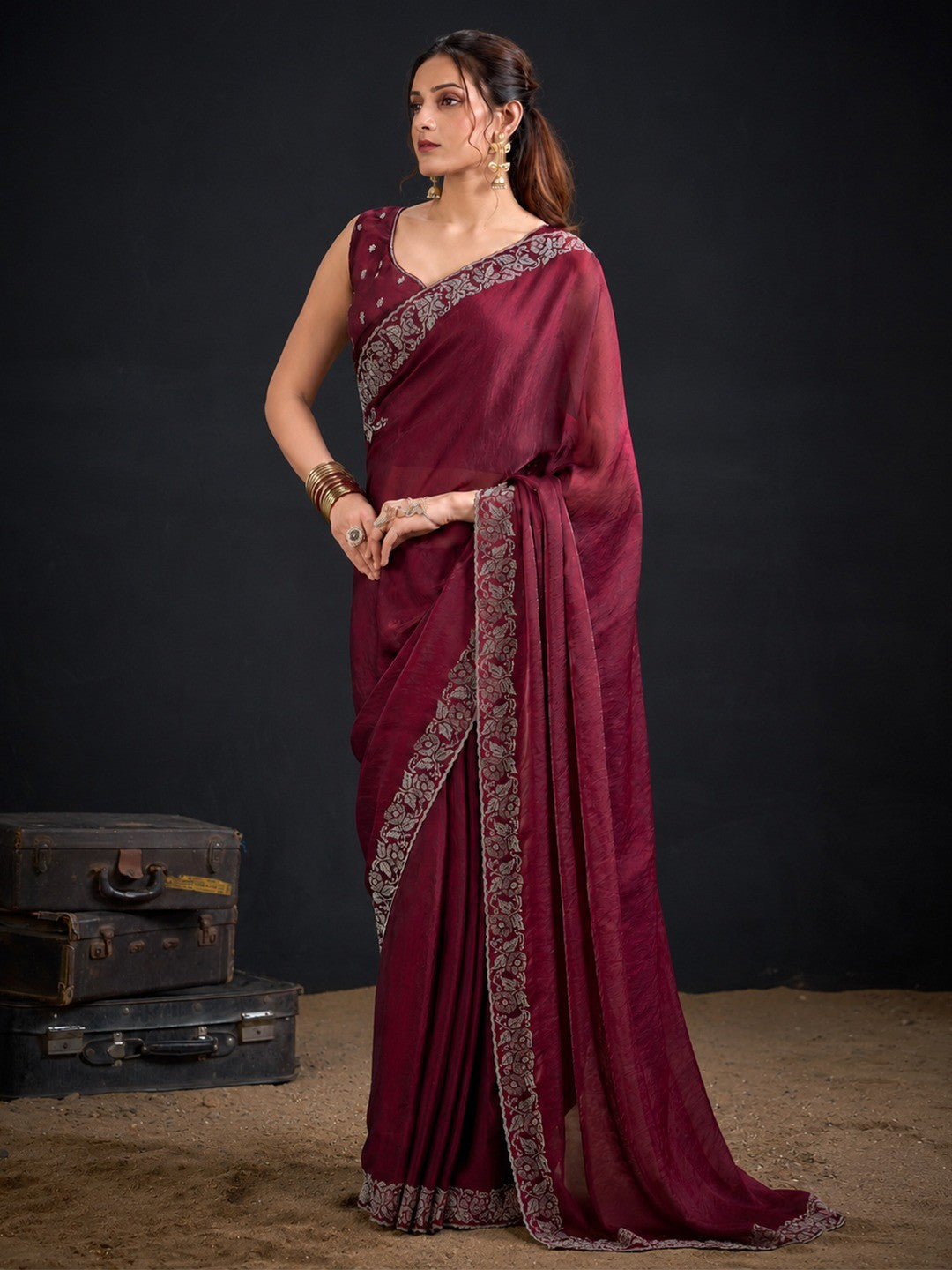 Luxurious Maroon Solid Satin Silk Saree Adorned With Floral Stone Work Border - Image 1