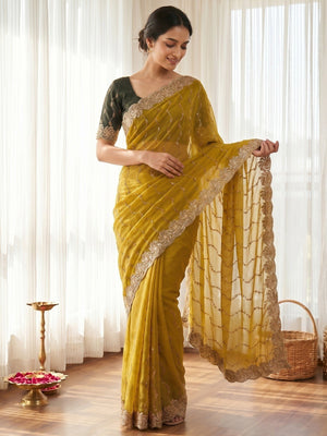 Graceful Dark Mustard Beads Embellished Georgette Saree With Floral Embroidery Detailing - Image 1