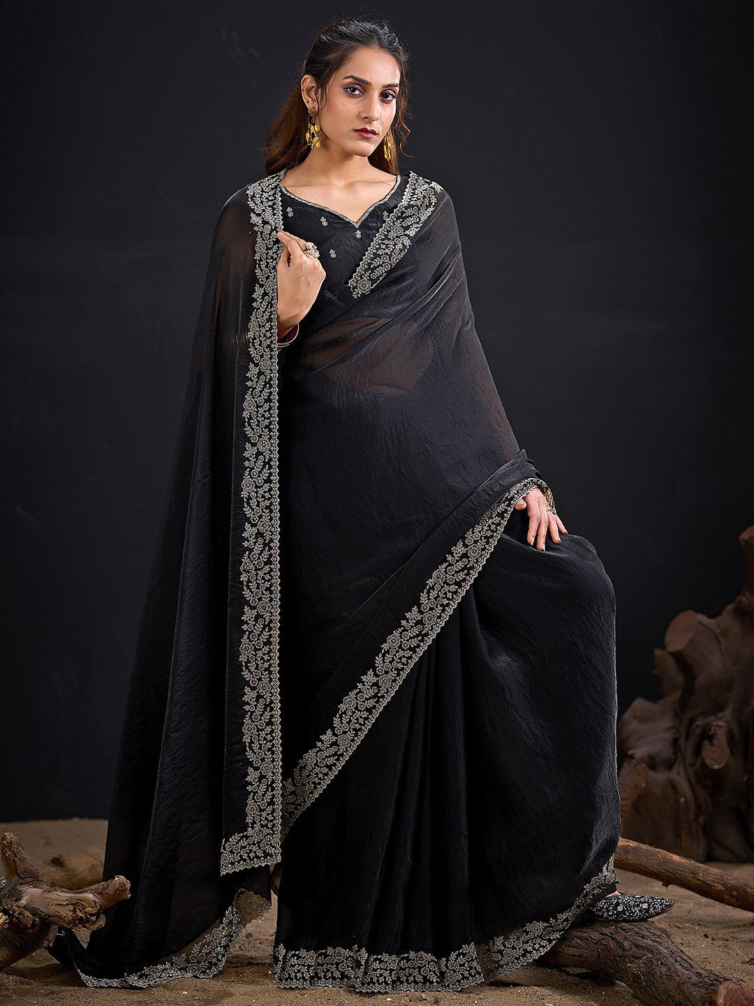 Glamorous Black Solid Satin Silk Saree Adorned With Floral Stone Embellished Border - Image 1