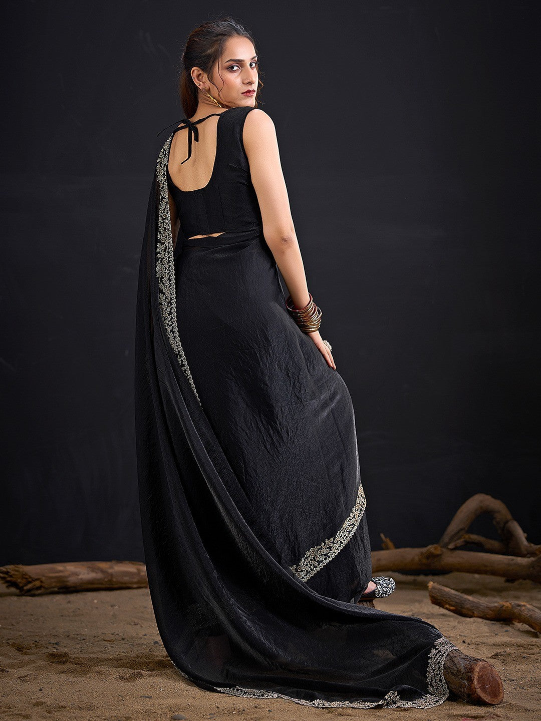 Glamorous Black Solid Satin Silk Saree Adorned With Floral Stone Embellished Border - Image 3
