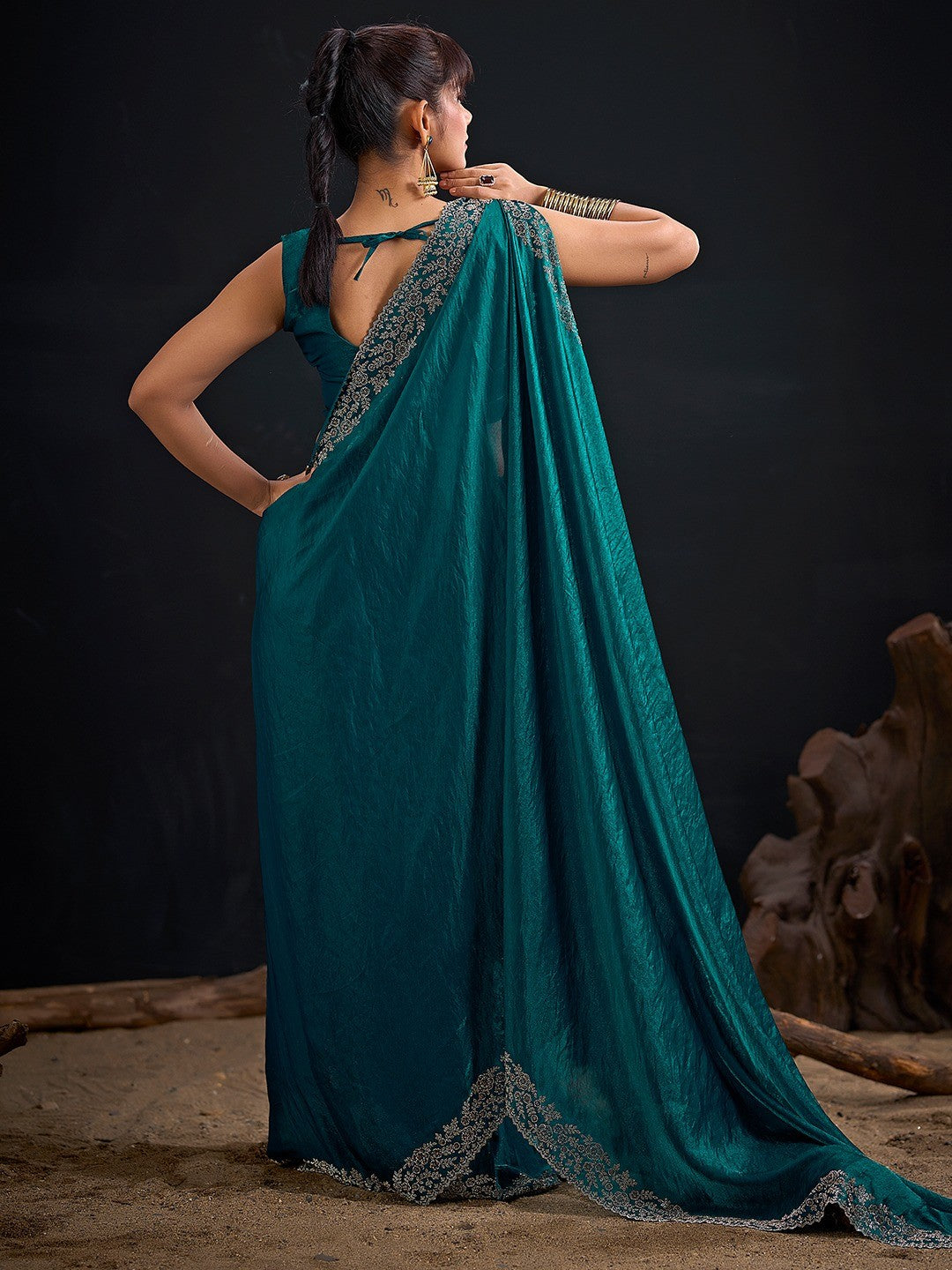 Glamorous Teal Solid Satin Silk Saree Adorned With Floral Stone Embellished Border - Image 6