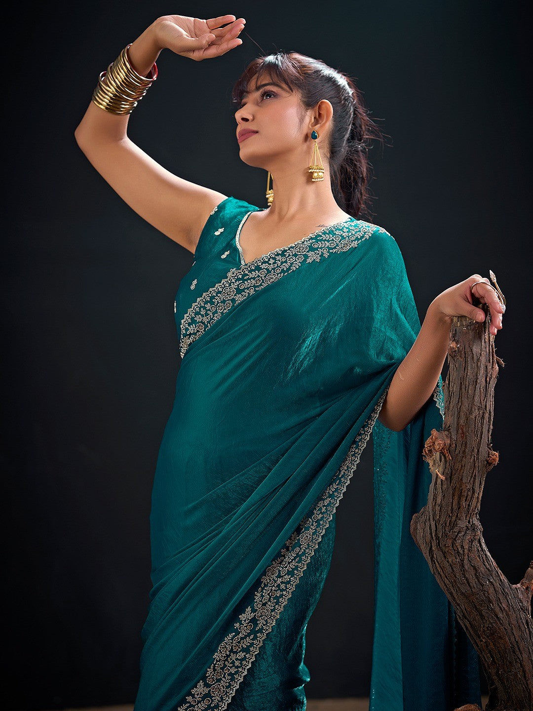 Glamorous Teal Solid Satin Silk Saree Adorned With Floral Stone Embellished Border - Image 5