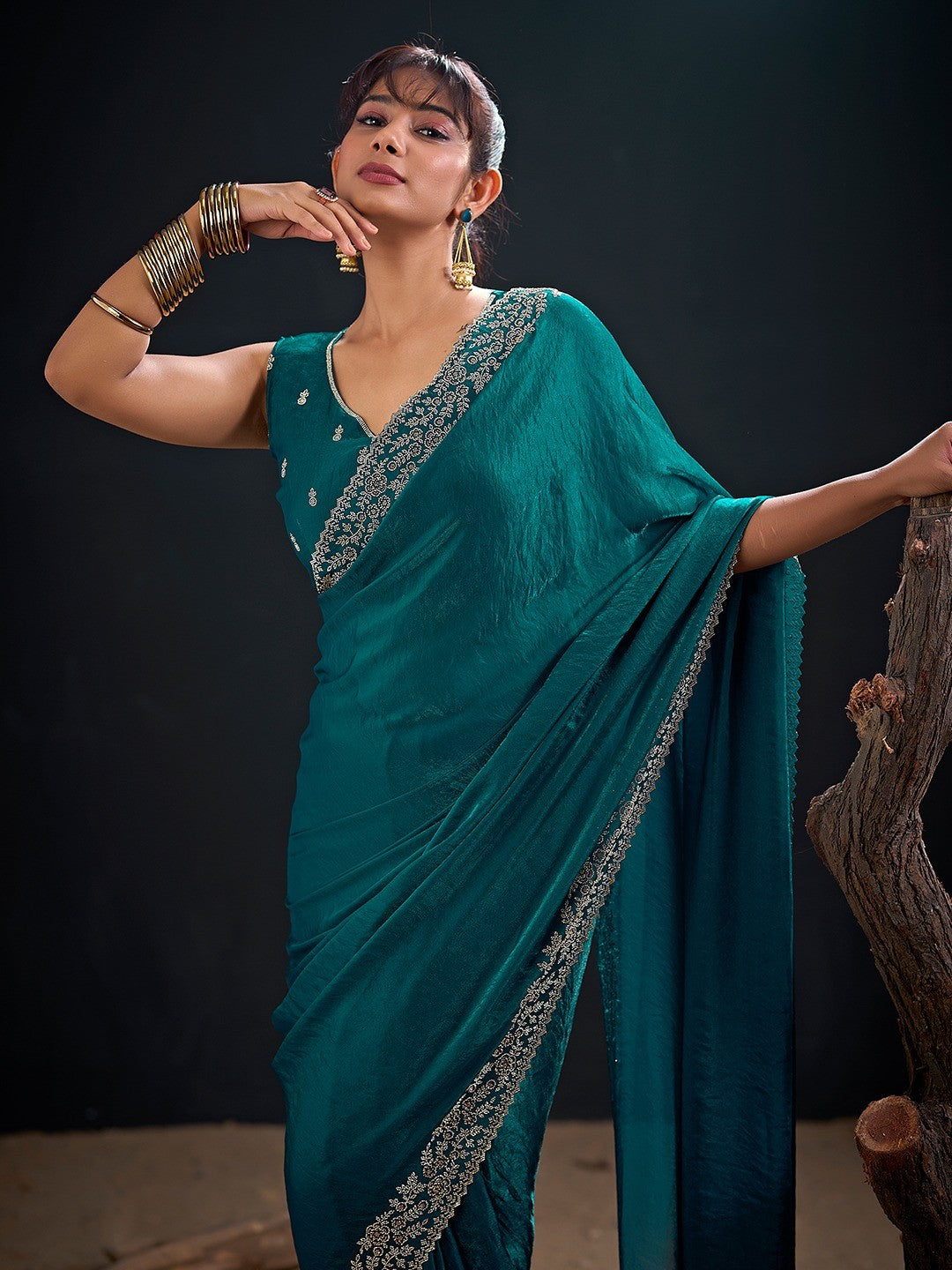 Glamorous Teal Solid Satin Silk Saree Adorned With Floral Stone Embellished Border - Image 2