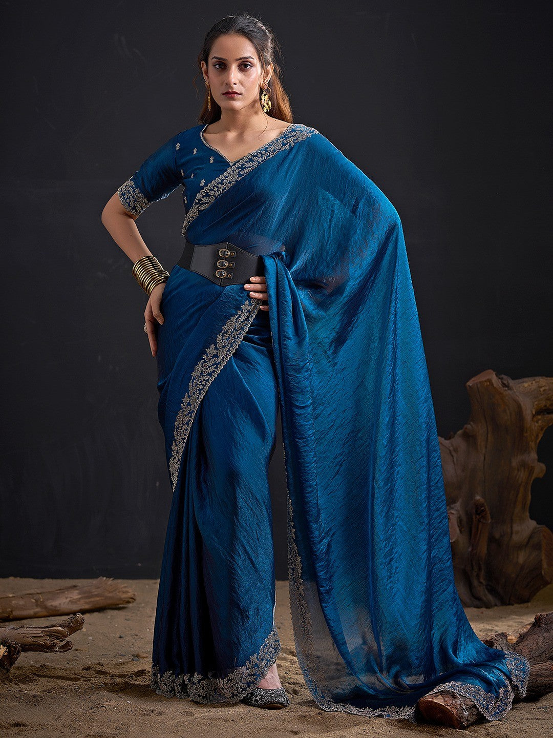 Glamorous Blue Solid Satin Silk Saree Adorned With Floral Stone Embellished Border - Image 1