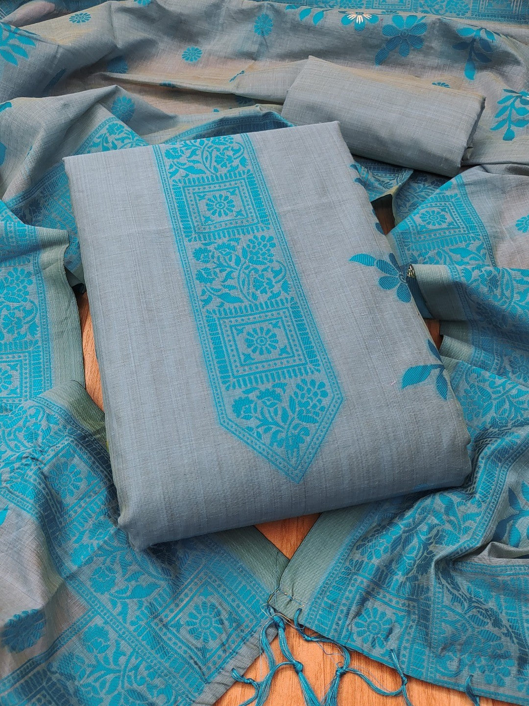 Designer Grey & Blue Muga Cotton Blend Jamdani Dress Material With Floral Zari Weaving - Image 1