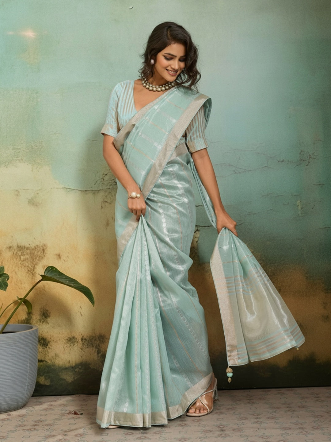 Peachmode Sea Green Tissue Linen Blend Saree with Zari Woven Border - Image 1
