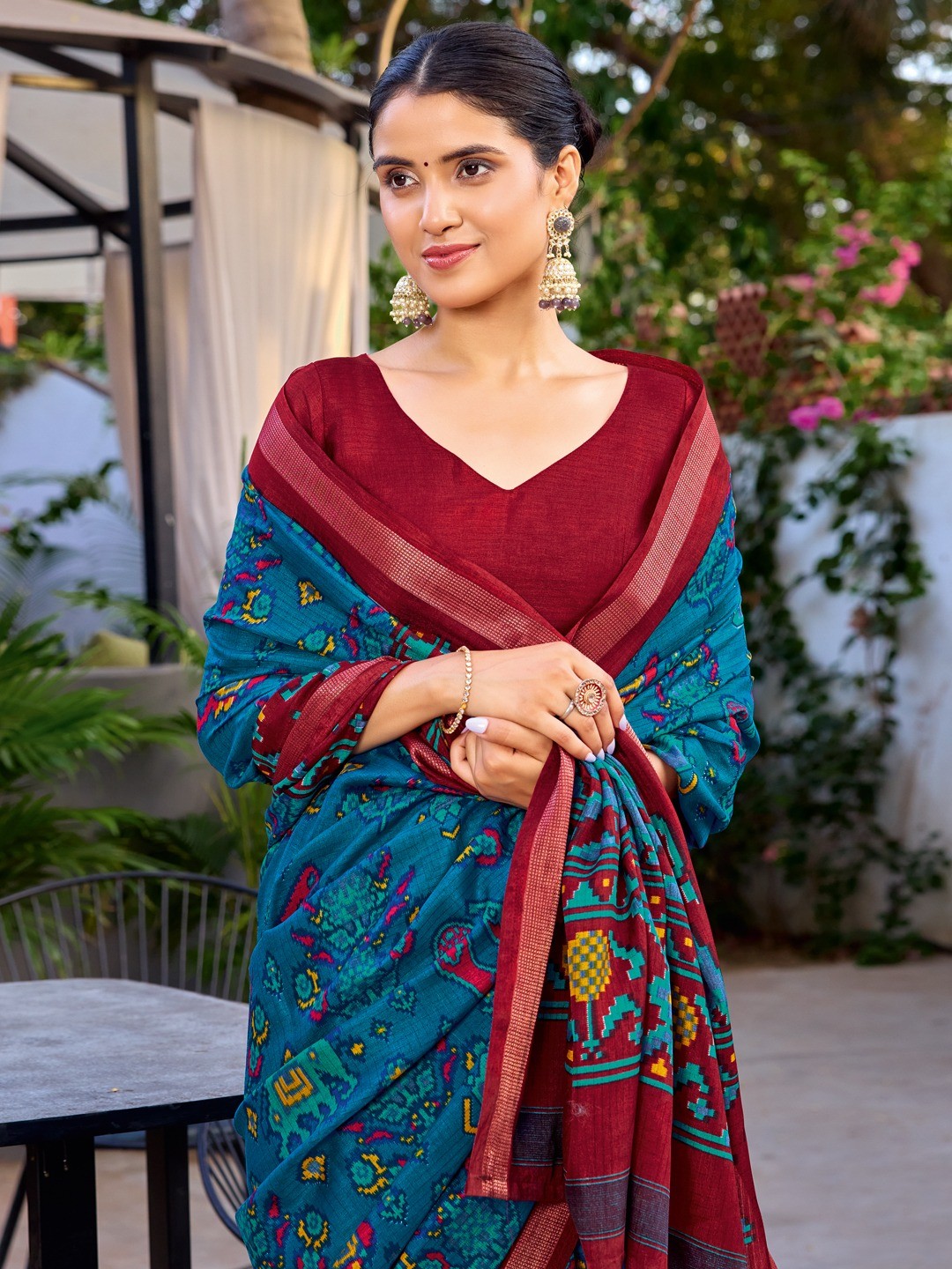 Teal Tussar Silk Saree with Elegant Ikkat Motifs and Modern Styling - Image 2