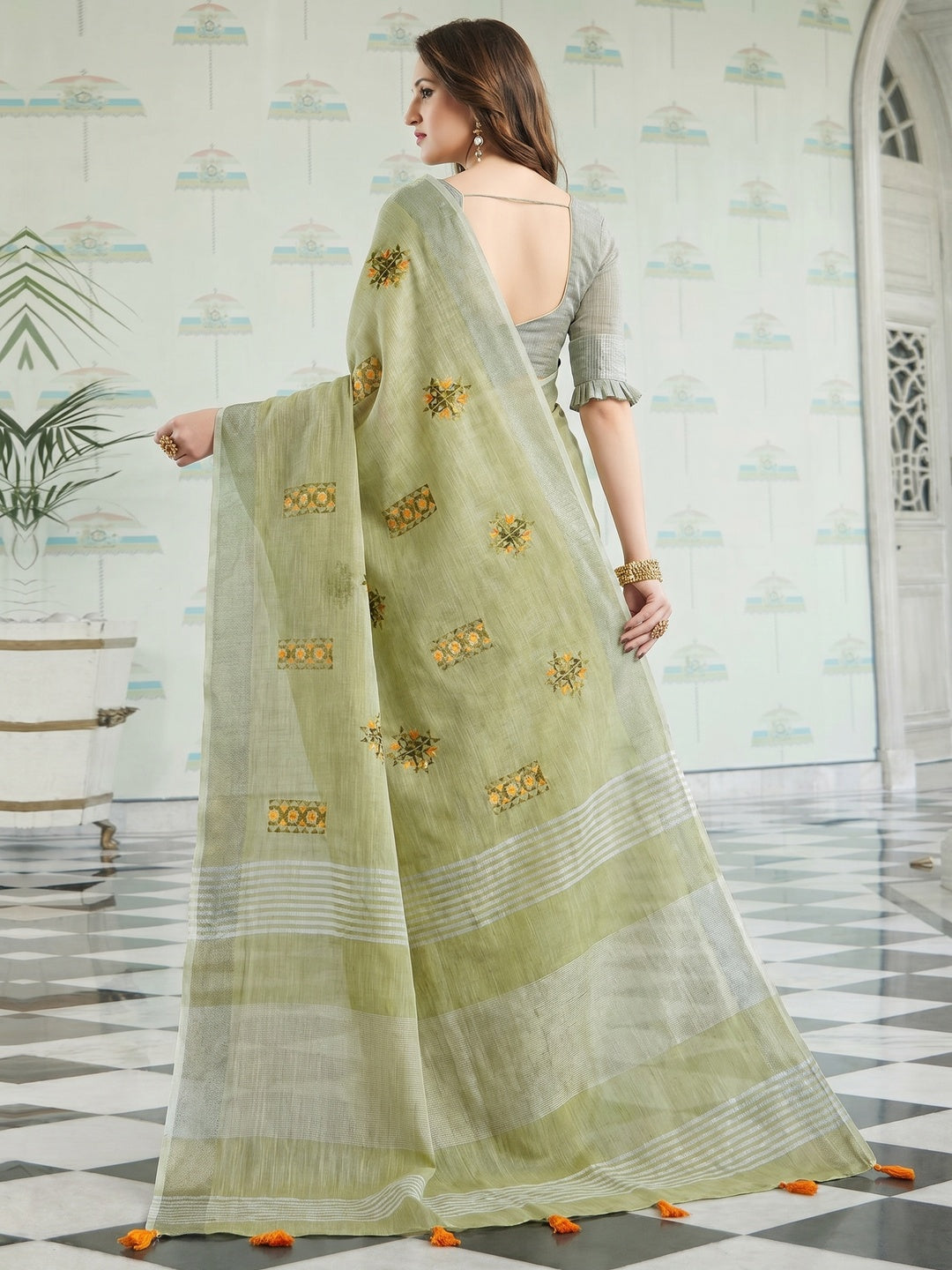 Arresting Pastel Green Colored Casual Wear Floral Embroidered Linen-Cotton Saree With Tassels - Image 2