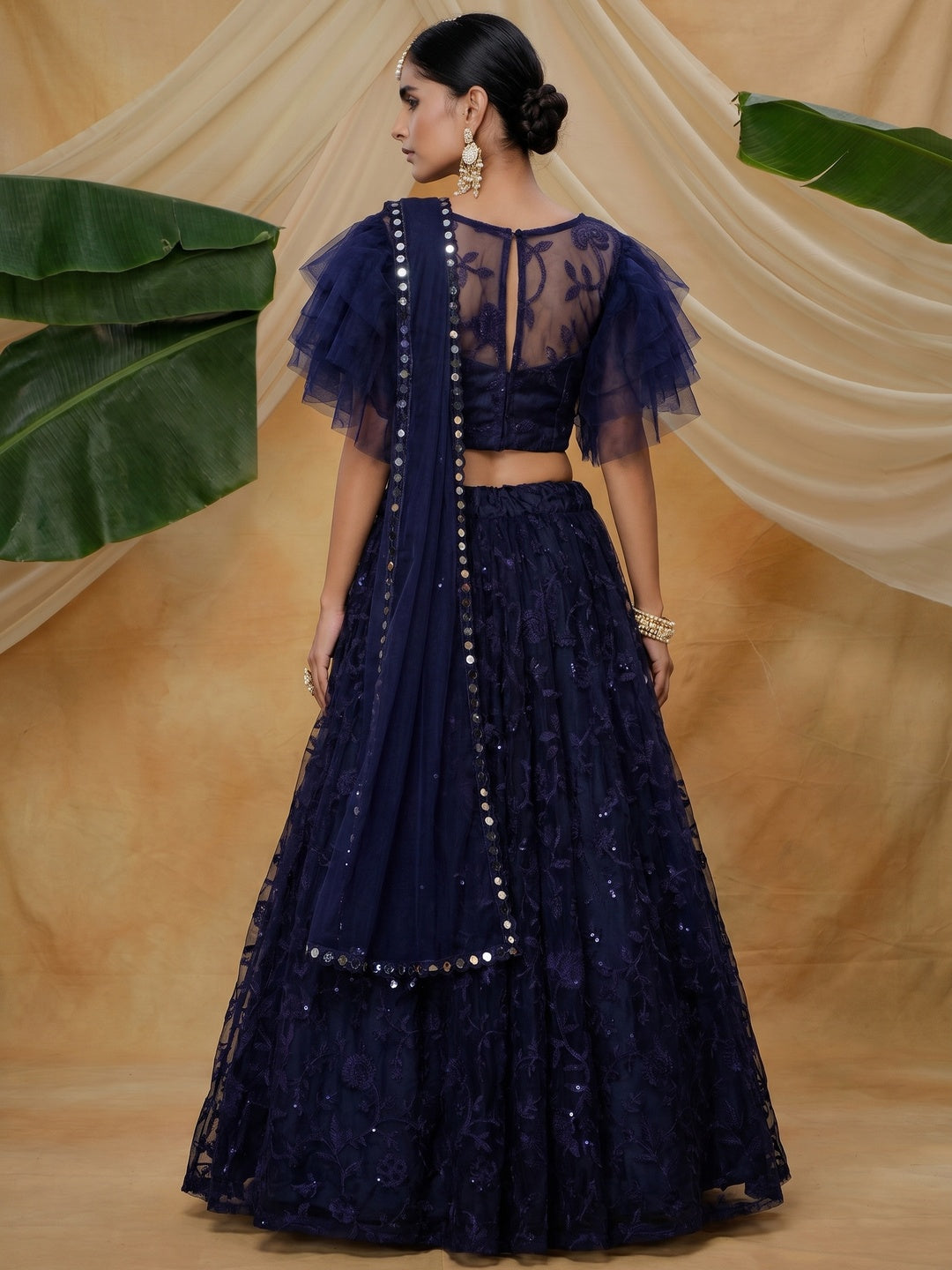 Hypnotic Navy Blue Colored Designer Partywear Embroidered Net Lehenga Choli - Image 1