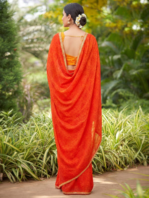 Orange Printed With Sequins Embroidered Border Georgette Saree - Image 1