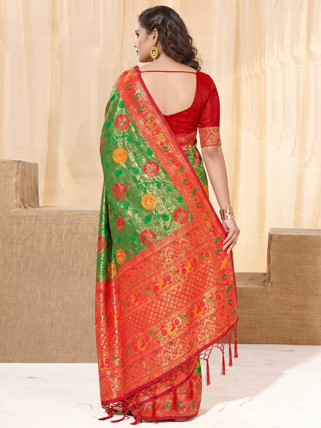 Green Floral Woven Kanjivaram Silk Saree With Tassels - Image 1