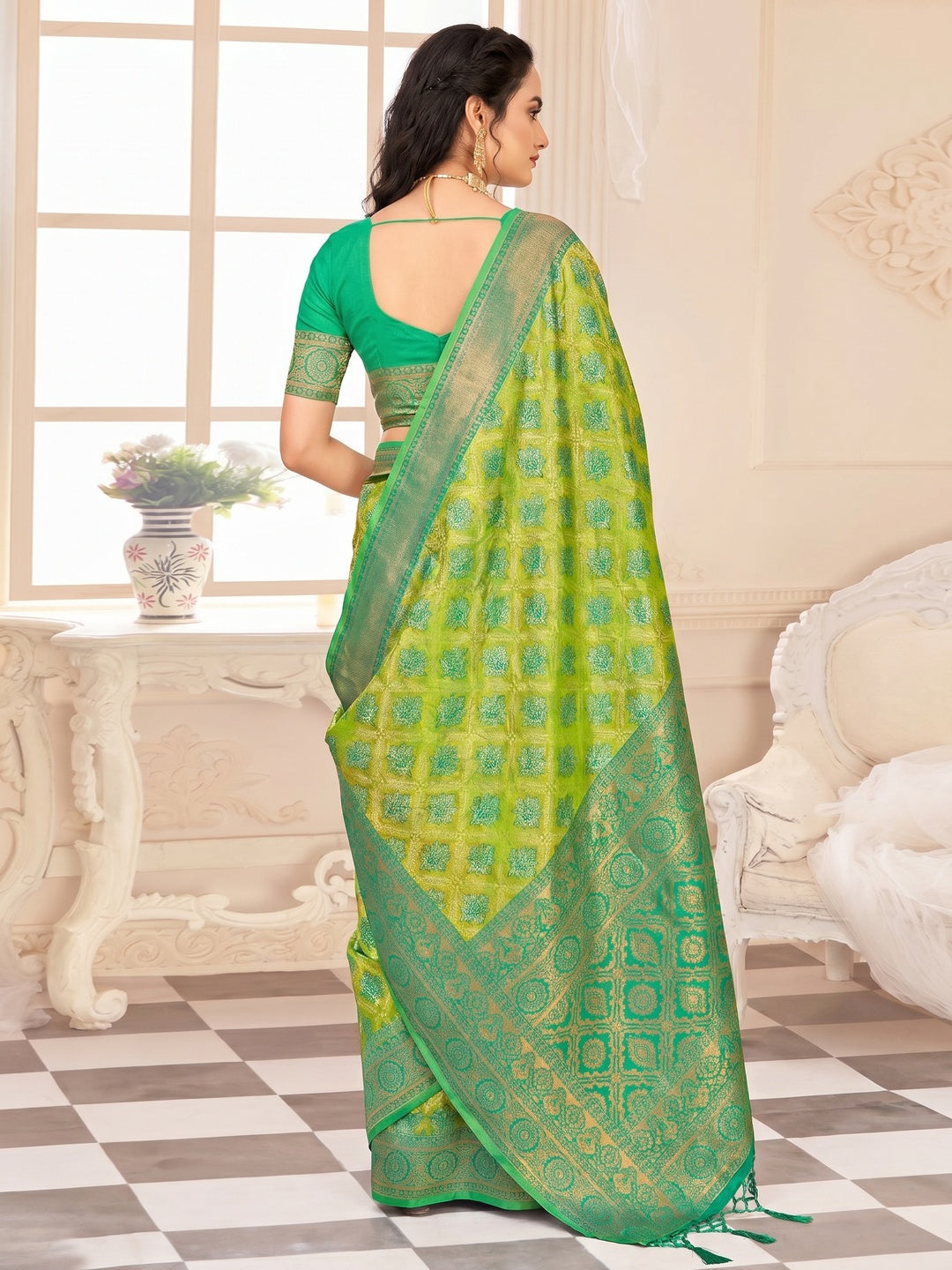 Green Floral Woven Kanjivaram Silk Saree With Tassels - Image 1