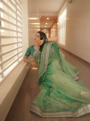 Peachmode Green Twill Net Saree with Sequins Embroidery - Image 1