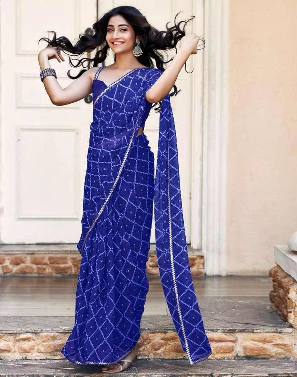 Peachmode Blue Georgette Bandhani Saree with Sequins Lace Border - Image 1