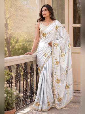White Silk Blend Saree Featuring Delicate Floral Motifs in Shimmering Sequins - Image 2