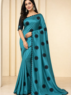 Peachmode Teal Georgette Silk Embroidered Suryamukhi Saree - Image 1
