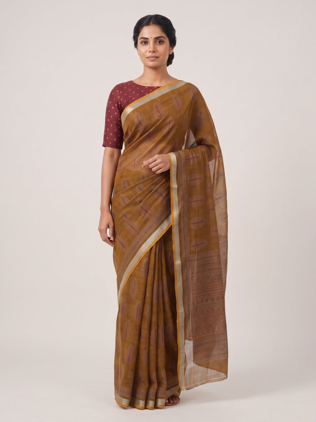 Classic Mustard Linen Cotton Saree Featuring Floral Ajrakh Print & Rich Silver Zari Border - Image 1