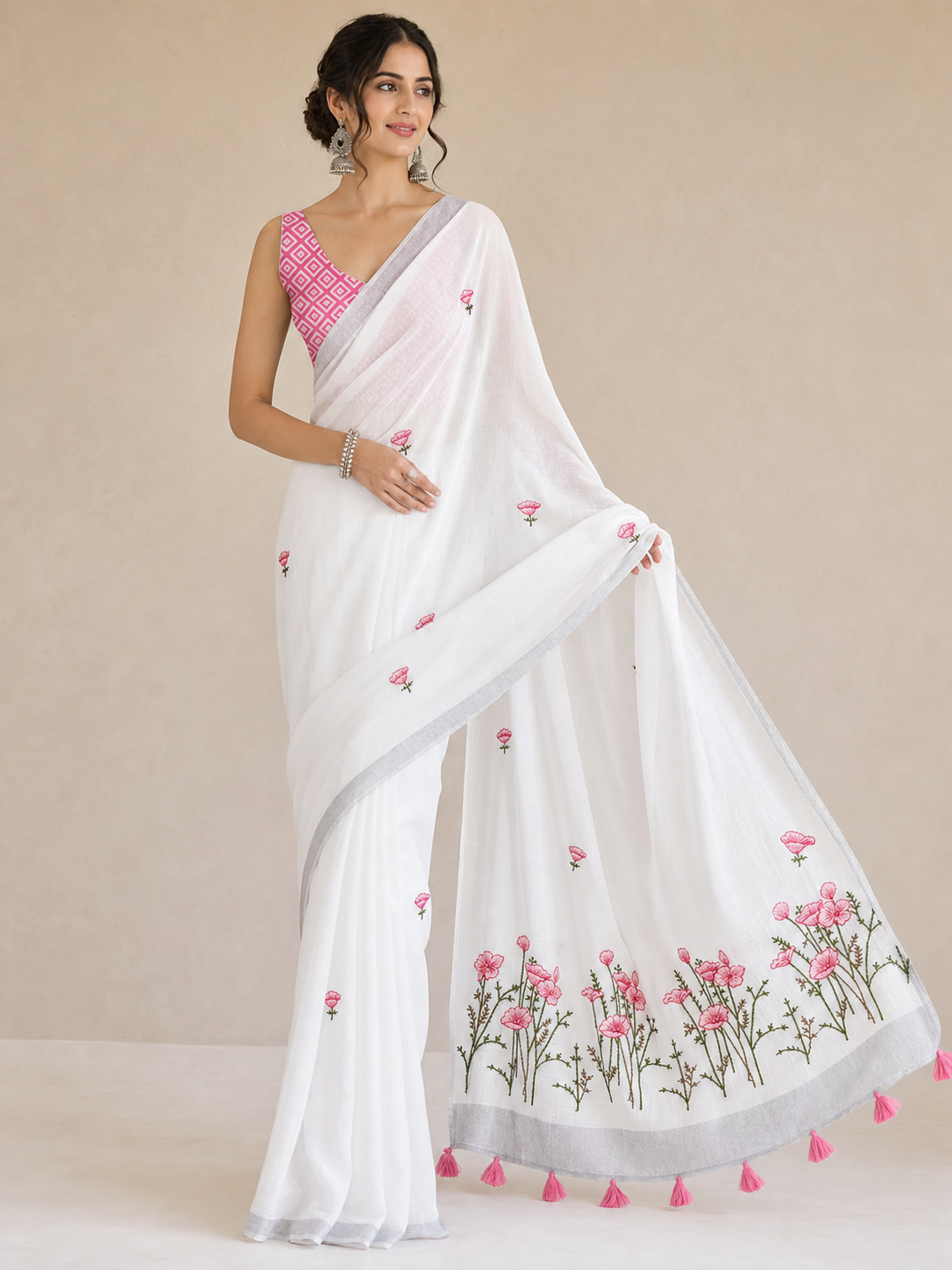 White Pure Linen Saree with Floral Embroidery and Tassel Detailing - Image 1