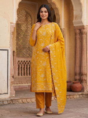 Elegant Mustard Vichitra Silk Dress Material Adorned With Exquisite Floral Zari Embroidery Work - Image 1