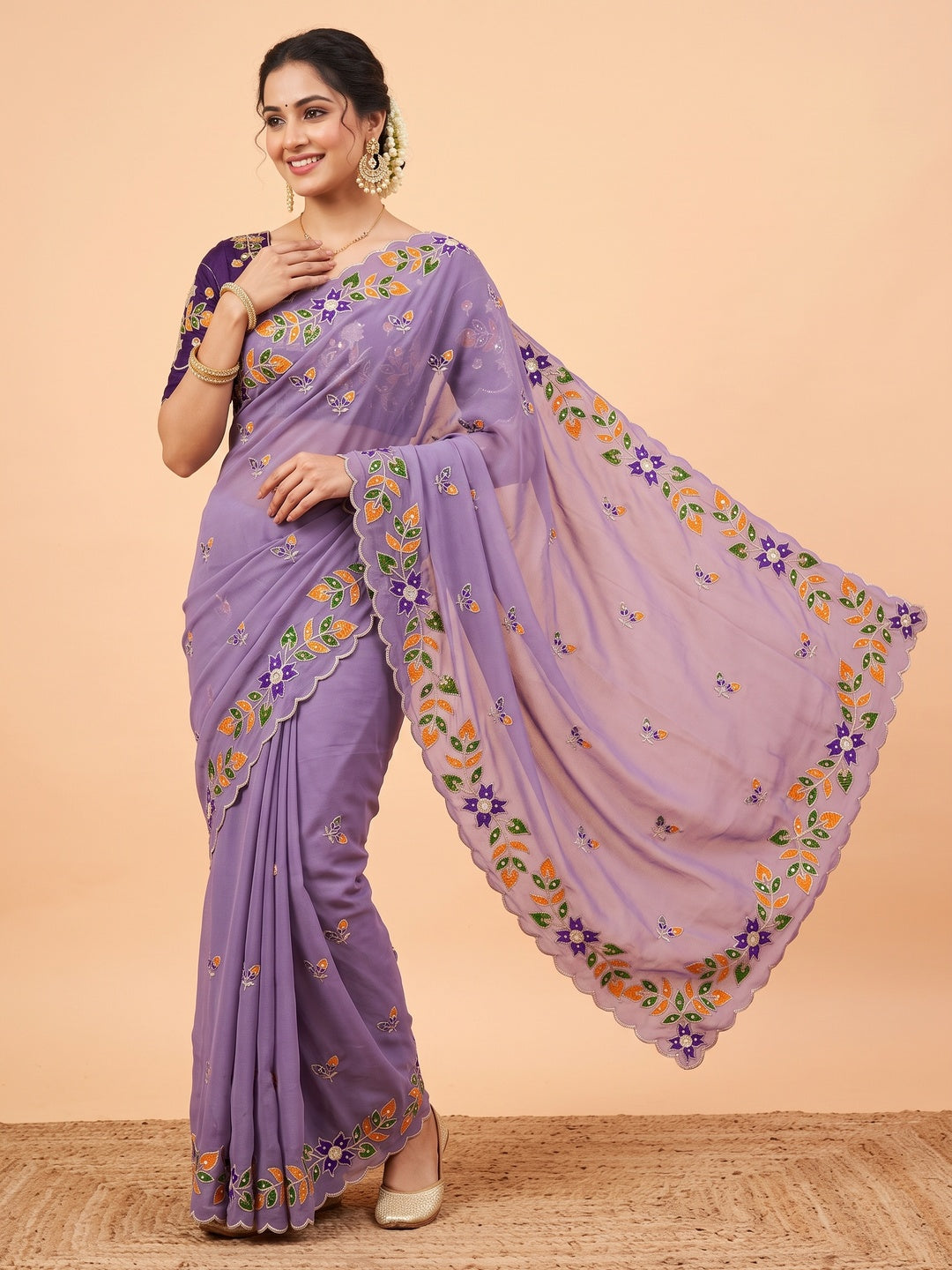 Peachmode Lavender Embroidered Shining Georgette Saree - Image 1