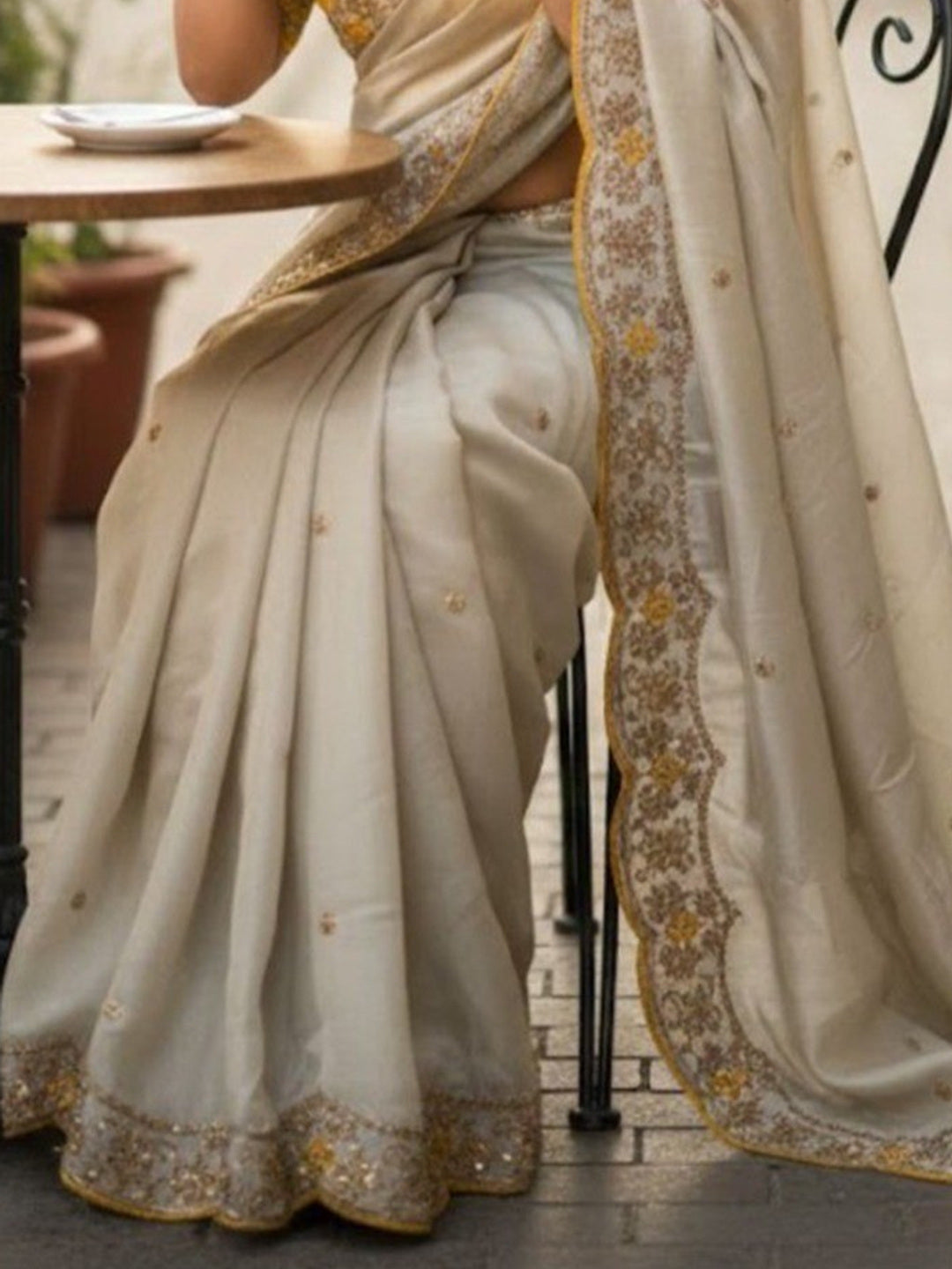 Elegant Cream Chiffon Saree with Sequins Work and Embroidered Border - Image 2