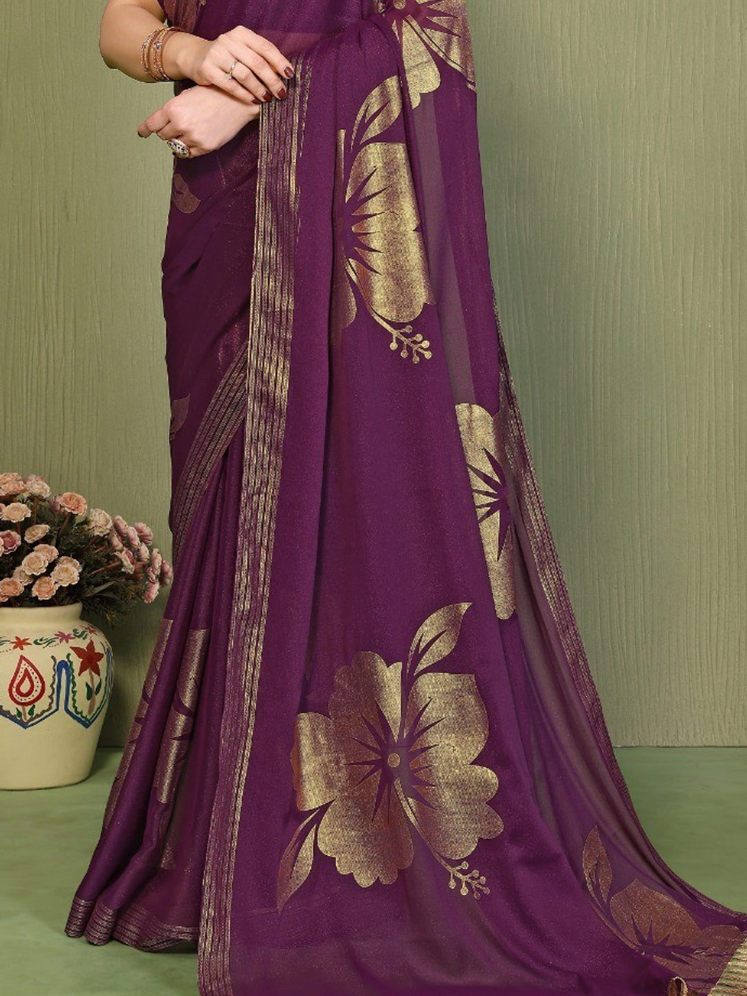 Elegant Wine Georgette Saree Adorned With Floral Foil Print & Rich Zari Border With Tassel Pallu - Image 1