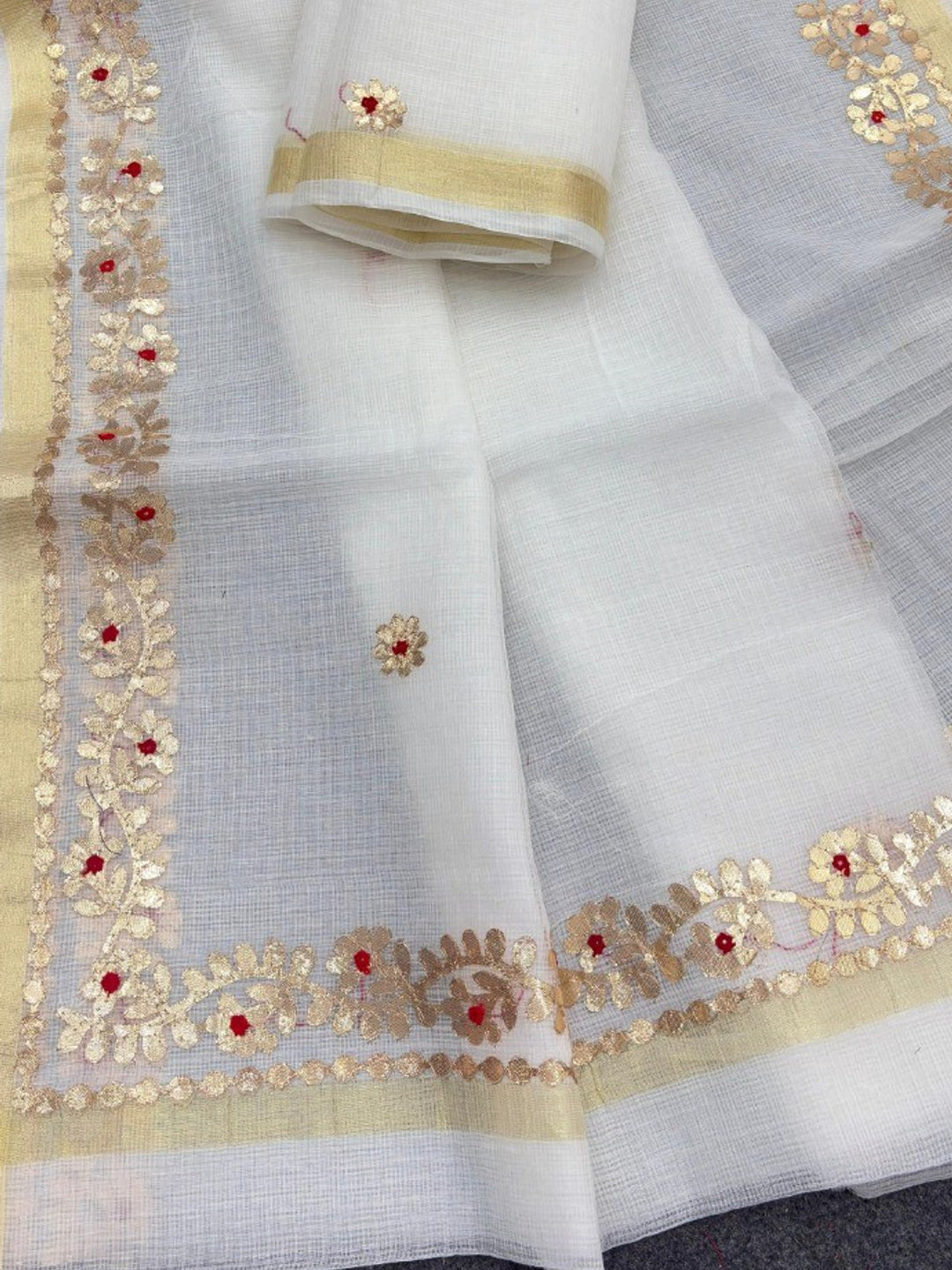Graceful White Kota Doria Saree Adorned With Delicate Floral Gota Patti & Zari Weaving Border - Image 2