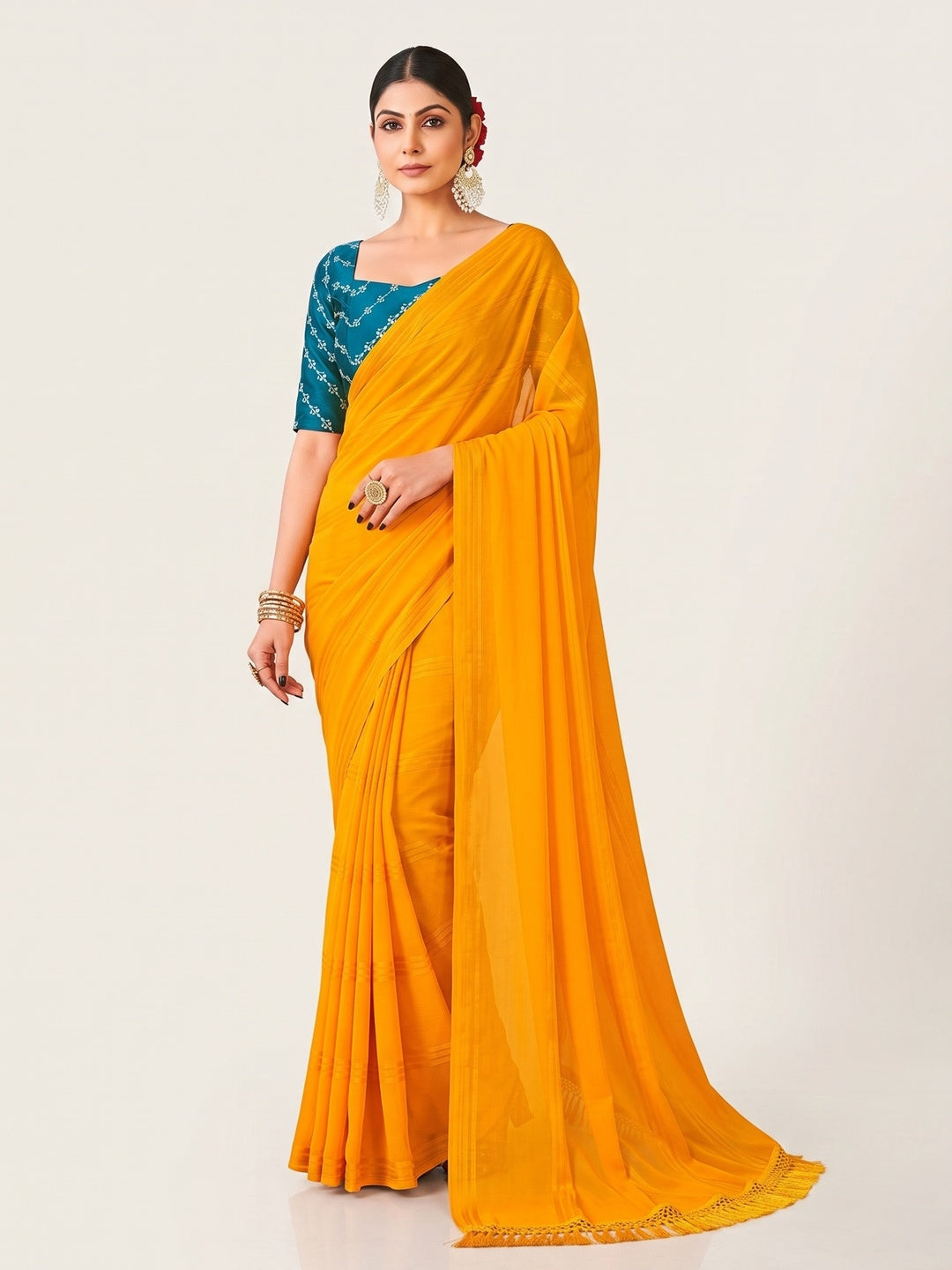 Mustard Printed Georgette Saree With Tassels - Image 1