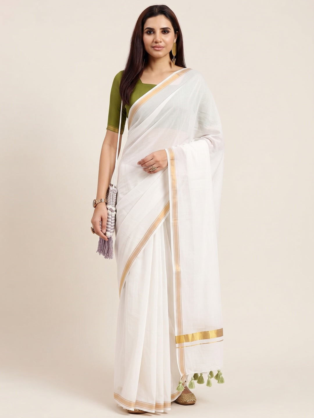 Charming White Solid Mulmul Cotton Saree Highlighted By Zari Weaving Border & Tassel Pallu - Image 3