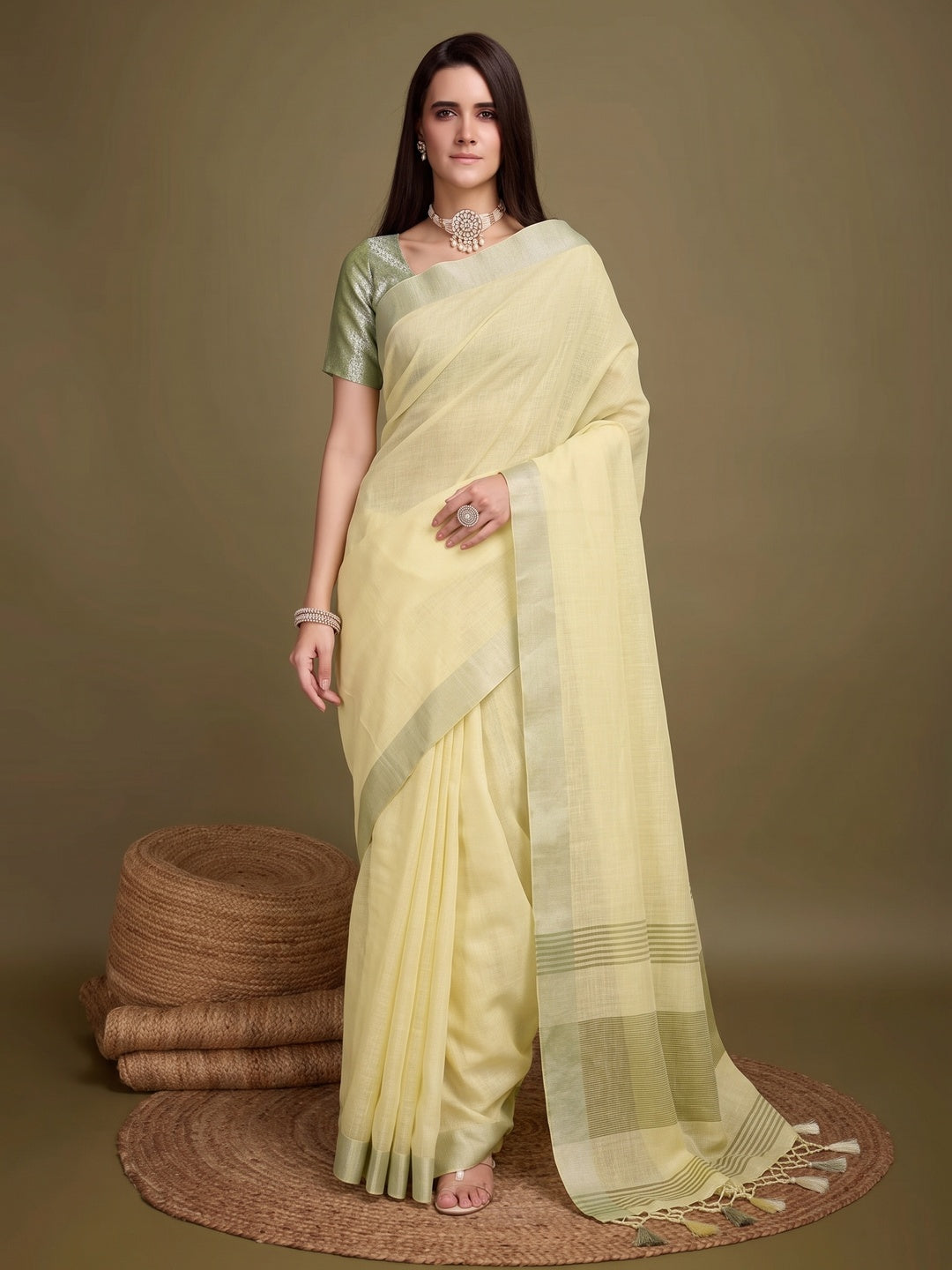 Sophisticated Yellow Linen Saree Featuring Intricate Zari Weaving & Tassel Accents - Image 1