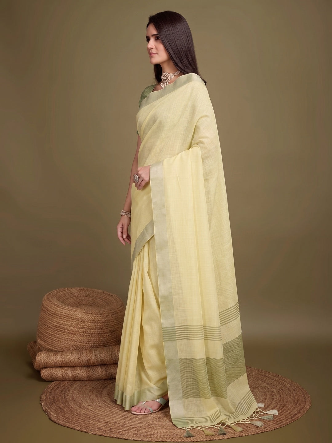 Sophisticated Yellow Linen Saree Featuring Intricate Zari Weaving & Tassel Accents - Image 3