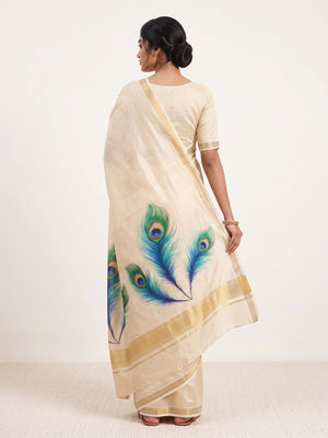 Charming Cream Soft Tussar Cotton Silk Saree With Peacock Feathers Print - Image 2
