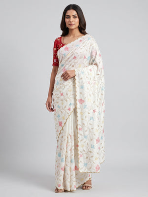 Graceful White Vichitra Silk Saree Adorned With Floral Sequins Embroidery & Golden Arco Border - Image 1
