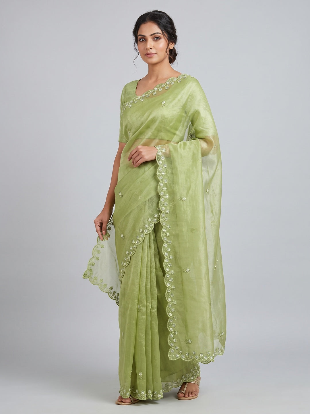Green Net Partywear Saree Featuring Fine Floral Embroidery and a Soft, Flowing Look - Image 1